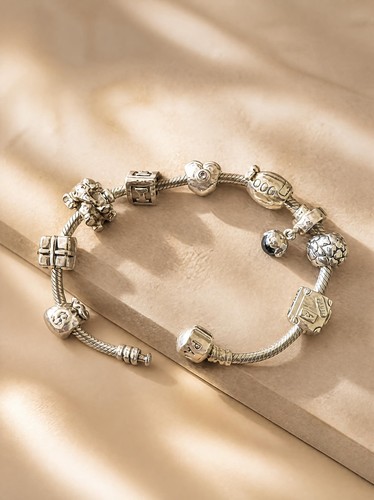 Pandora armband mit charms - 9,